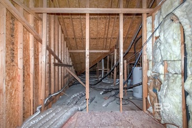 Charming cottage - style home located on #9 green on the Pine on TimberCreek Golf Club in Alabama - for sale on GolfHomes.com, golf home, golf lot