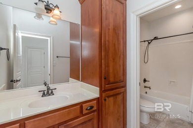 Charming cottage - style home located on #9 green on the Pine on TimberCreek Golf Club in Alabama - for sale on GolfHomes.com, golf home, golf lot