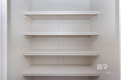 Charming cottage - style home located on #9 green on the Pine on TimberCreek Golf Club in Alabama - for sale on GolfHomes.com, golf home, golf lot