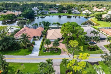 Nestled in the prestigious Marlwood Estates of PGA National on PGA National Golf Club in Florida - for sale on GolfHomes.com, golf home, golf lot