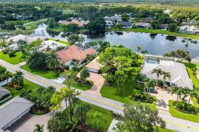 Nestled in the prestigious Marlwood Estates of PGA National on PGA National Golf Club in Florida - for sale on GolfHomes.com, golf home, golf lot