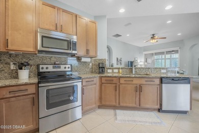 Welcome to 1143 Champions Drive, a beautifully maintained home on LPGA International Golf Course in Florida - for sale on GolfHomes.com, golf home, golf lot