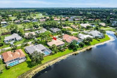 Nestled in the prestigious Marlwood Estates of PGA National on PGA National Golf Club in Florida - for sale on GolfHomes.com, golf home, golf lot