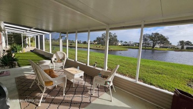 Come take a tour of this 2016 Palm Harbor Wellington Model one on The Riverside Golf Club in Florida - for sale on GolfHomes.com, golf home, golf lot