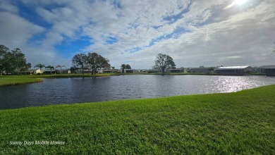 Come take a tour of this 2016 Palm Harbor Wellington Model one on The Riverside Golf Club in Florida - for sale on GolfHomes.com, golf home, golf lot