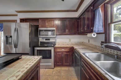 This home offers a lot for an amazing price! First and foremost on The Hackler Course at Coastal Carolina University in South Carolina - for sale on GolfHomes.com, golf home, golf lot
