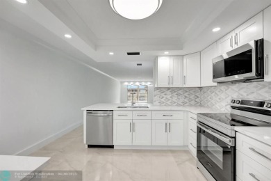 Stunning Corner Unit in Wynmoor! ALL appliances are NEW. NO on Wynmoor Golf Course in Florida - for sale on GolfHomes.com, golf home, golf lot