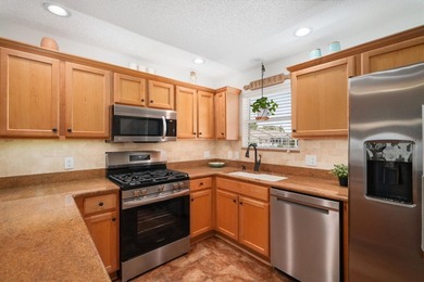 Welcome home to this beautifully maintained 3-bedroom, 2-bath on Glenview Championship Golf and Country Club in Florida - for sale on GolfHomes.com, golf home, golf lot