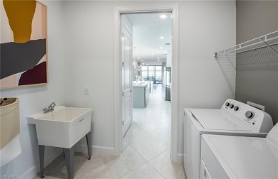 Move-in ready and located in the highly desirable gated on Valencia Golf and Country Club in Florida - for sale on GolfHomes.com, golf home, golf lot