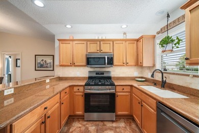 Welcome home to this beautifully maintained 3-bedroom, 2-bath on Glenview Championship Golf and Country Club in Florida - for sale on GolfHomes.com, golf home, golf lot