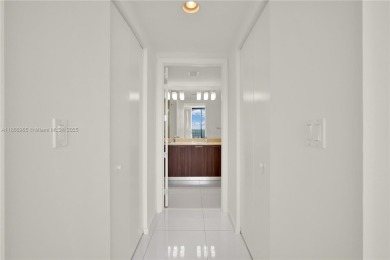 Exclusive residence in the heart of Downtown Doral. Corner unit on Doral Golf Resort in Florida - for sale on GolfHomes.com, golf home, golf lot