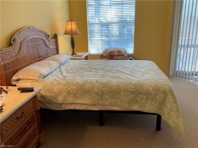 GOLF INCLUDED, second floor end unit Carriage Home with 2,045 on Colonial Country Club in Florida - for sale on GolfHomes.com, golf home, golf lot
