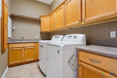 This beauty sits on Mill Creek Golf Course with fantastic views on Mill Creek Golf Club in Texas - for sale on GolfHomes.com, golf home, golf lot