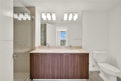 Exclusive residence in the heart of Downtown Doral. Corner unit on Doral Golf Resort in Florida - for sale on GolfHomes.com, golf home, golf lot