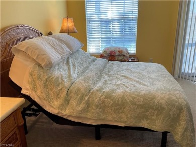 GOLF INCLUDED, second floor end unit Carriage Home with 2,045 on Colonial Country Club in Florida - for sale on GolfHomes.com, golf home, golf lot