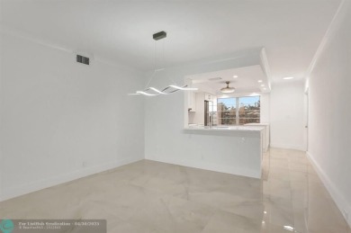 Stunning Corner Unit in Wynmoor! ALL appliances are NEW. NO on Wynmoor Golf Course in Florida - for sale on GolfHomes.com, golf home, golf lot