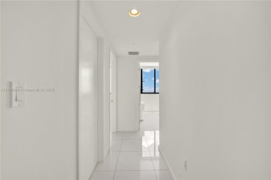 Exclusive residence in the heart of Downtown Doral. Corner unit on Doral Golf Resort in Florida - for sale on GolfHomes.com, golf home, golf lot