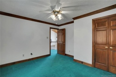 Let your worries and cares drift away at this waterfront retreat on Piankatank River Golf Club in Virginia - for sale on GolfHomes.com, golf home, golf lot