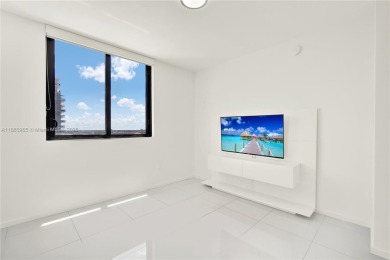Exclusive residence in the heart of Downtown Doral. Corner unit on Doral Golf Resort in Florida - for sale on GolfHomes.com, golf home, golf lot