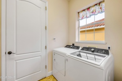 Welcome to your dream home in the sought-after Dunmore on Halifax Plantation Golf Club in Florida - for sale on GolfHomes.com, golf home, golf lot