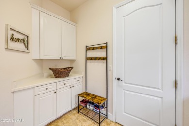 Welcome to your dream home in the sought-after Dunmore on Halifax Plantation Golf Club in Florida - for sale on GolfHomes.com, golf home, golf lot