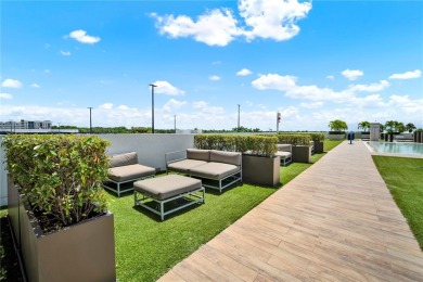 Exclusive residence in the heart of Downtown Doral. Corner unit on Doral Golf Resort in Florida - for sale on GolfHomes.com, golf home, golf lot