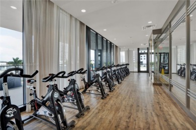 Exclusive residence in the heart of Downtown Doral. Corner unit on Doral Golf Resort in Florida - for sale on GolfHomes.com, golf home, golf lot