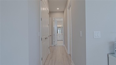 Elegant West Indies-Inspired semi-custom Home in Rivo Lakes - on Serenoa Golf Club in Florida - for sale on GolfHomes.com, golf home, golf lot