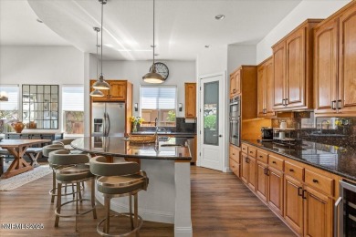Nestled on a quiet gated street in Somersett, just moments from on Somersett Country Club in Nevada - for sale on GolfHomes.com, golf home, golf lot