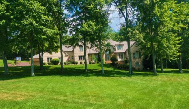 Nestled on a sprawling 1.53-acre lot in the prestigious on Christmas Lake Golf Course in Indiana - for sale on GolfHomes.com, golf home, golf lot