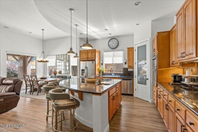 Nestled on a quiet gated street in Somersett, just moments from on Somersett Country Club in Nevada - for sale on GolfHomes.com, golf home, golf lot
