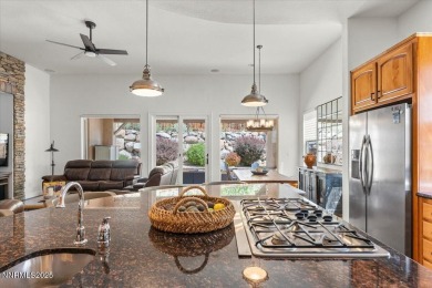 Nestled on a quiet gated street in Somersett, just moments from on Somersett Country Club in Nevada - for sale on GolfHomes.com, golf home, golf lot