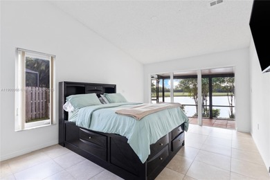 Charming One-Story Home with Golf and Lake Views in Doral Park! on Doral Golf Resort in Florida - for sale on GolfHomes.com, golf home, golf lot