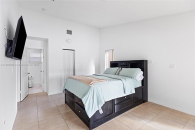 Charming One-Story Home with Golf and Lake Views in Doral Park! on Doral Golf Resort in Florida - for sale on GolfHomes.com, golf home, golf lot