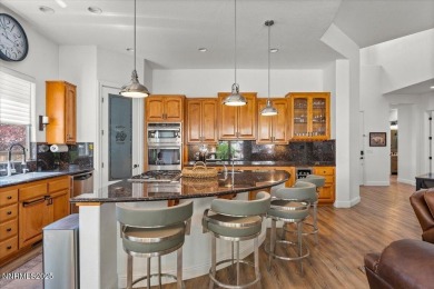 Nestled on a quiet gated street in Somersett, just moments from on Somersett Country Club in Nevada - for sale on GolfHomes.com, golf home, golf lot