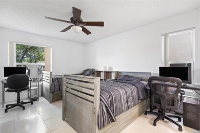 Charming One-Story Home with Golf and Lake Views in Doral Park! on Doral Golf Resort in Florida - for sale on GolfHomes.com, golf home, golf lot