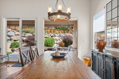 Nestled on a quiet gated street in Somersett, just moments from on Somersett Country Club in Nevada - for sale on GolfHomes.com, golf home, golf lot