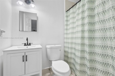 Charming One-Story Home with Golf and Lake Views in Doral Park! on Doral Golf Resort in Florida - for sale on GolfHomes.com, golf home, golf lot