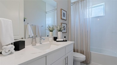 Elegant West Indies-Inspired semi-custom Home in Rivo Lakes - on Serenoa Golf Club in Florida - for sale on GolfHomes.com, golf home, golf lot