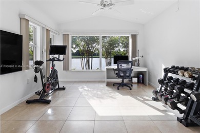 Charming One-Story Home with Golf and Lake Views in Doral Park! on Doral Golf Resort in Florida - for sale on GolfHomes.com, golf home, golf lot