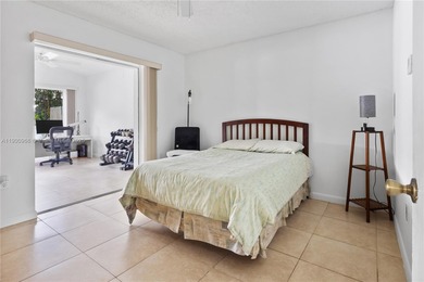 Charming One-Story Home with Golf and Lake Views in Doral Park! on Doral Golf Resort in Florida - for sale on GolfHomes.com, golf home, golf lot