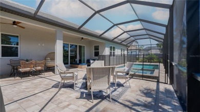 Elegant West Indies-Inspired semi-custom Home in Rivo Lakes - on Serenoa Golf Club in Florida - for sale on GolfHomes.com, golf home, golf lot