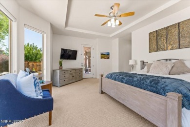 Nestled on a quiet gated street in Somersett, just moments from on Somersett Country Club in Nevada - for sale on GolfHomes.com, golf home, golf lot
