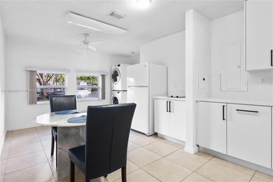 Charming One-Story Home with Golf and Lake Views in Doral Park! on Doral Golf Resort in Florida - for sale on GolfHomes.com, golf home, golf lot