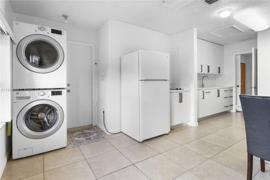 Charming One-Story Home with Golf and Lake Views in Doral Park! on Doral Golf Resort in Florida - for sale on GolfHomes.com, golf home, golf lot