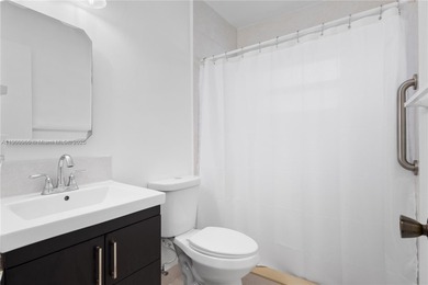 Charming One-Story Home with Golf and Lake Views in Doral Park! on Doral Golf Resort in Florida - for sale on GolfHomes.com, golf home, golf lot