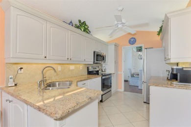 Attractive two bedroom, plus den, two bath, paired villa, in the on Capri Isle Golf Club in Florida - for sale on GolfHomes.com, golf home, golf lot