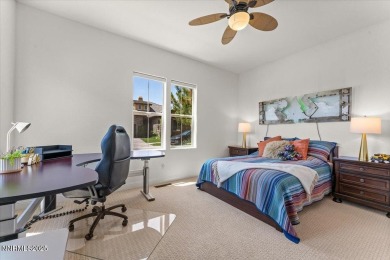 Nestled on a quiet gated street in Somersett, just moments from on Somersett Country Club in Nevada - for sale on GolfHomes.com, golf home, golf lot