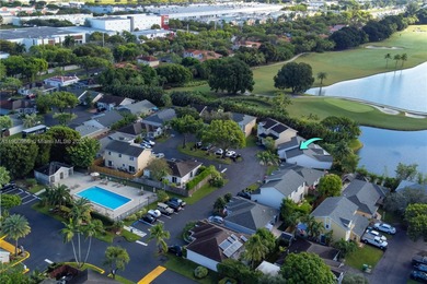 Charming One-Story Home with Golf and Lake Views in Doral Park! on Doral Golf Resort in Florida - for sale on GolfHomes.com, golf home, golf lot