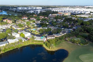 Charming One-Story Home with Golf and Lake Views in Doral Park! on Doral Golf Resort in Florida - for sale on GolfHomes.com, golf home, golf lot